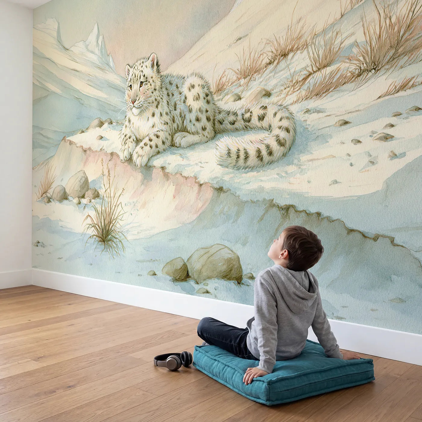 Child in nursery with Gentle Snow Leopard Wallpaper Mural by Whimsy Tots