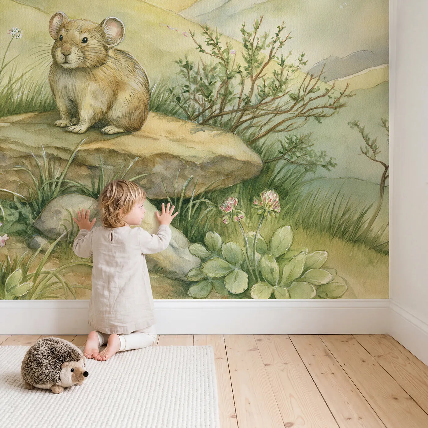 Child in nursery with Little Alpine Pika Wallpaper Mural by Whimsy Tots