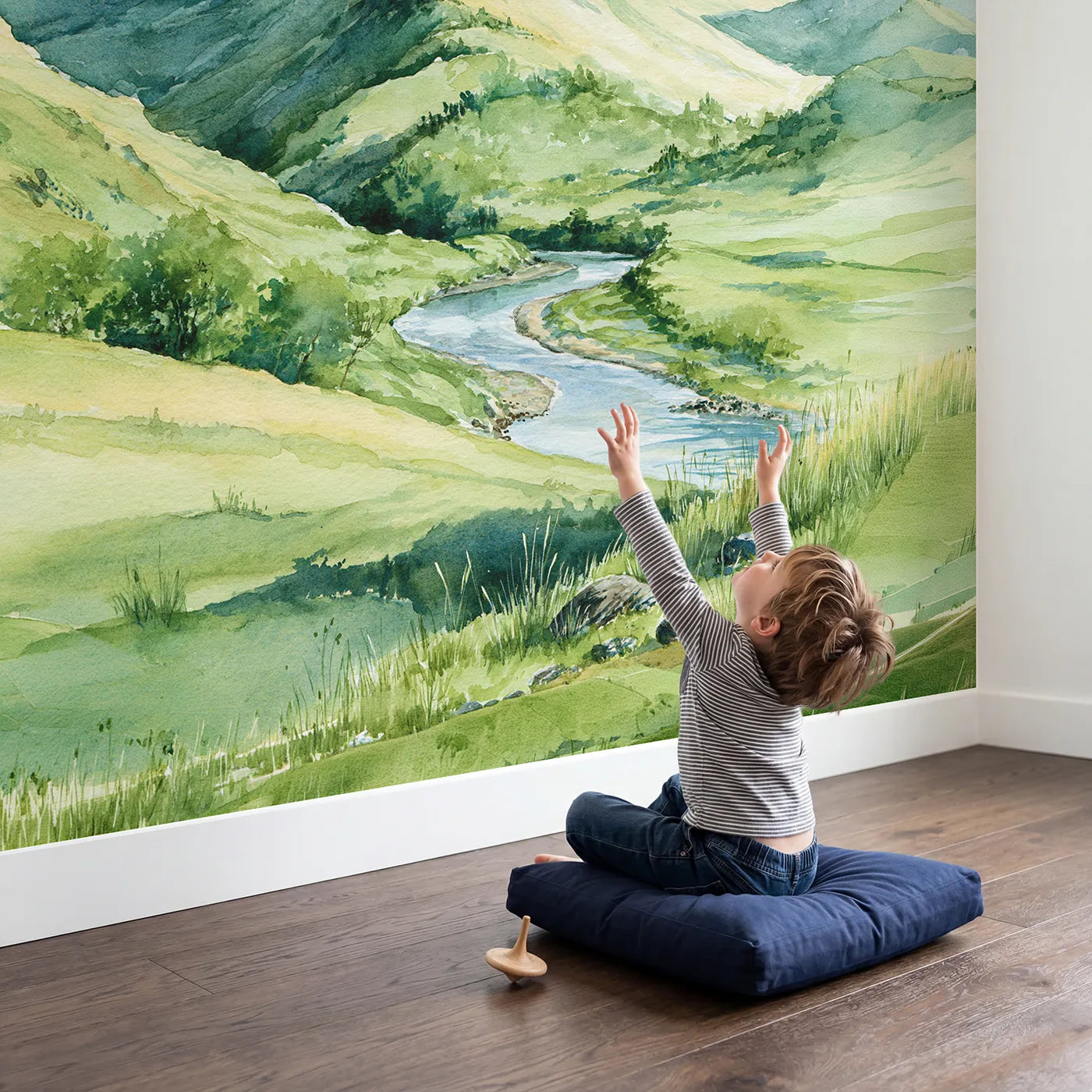 Child in nursery with Midday Rolling Hills River Wallpaper Mural by Whimsy Tots