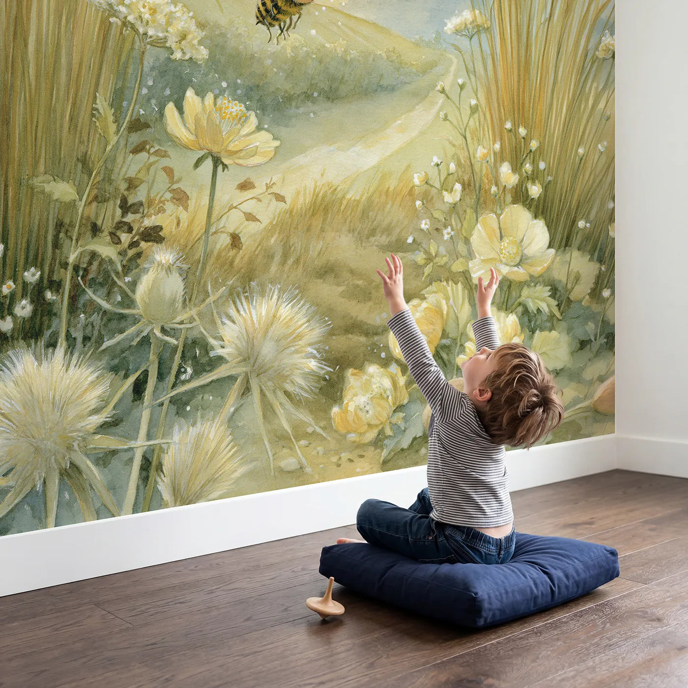 Child in nursery with Friendly Garden Bee Wallpaper Mural by Whimsy Tots