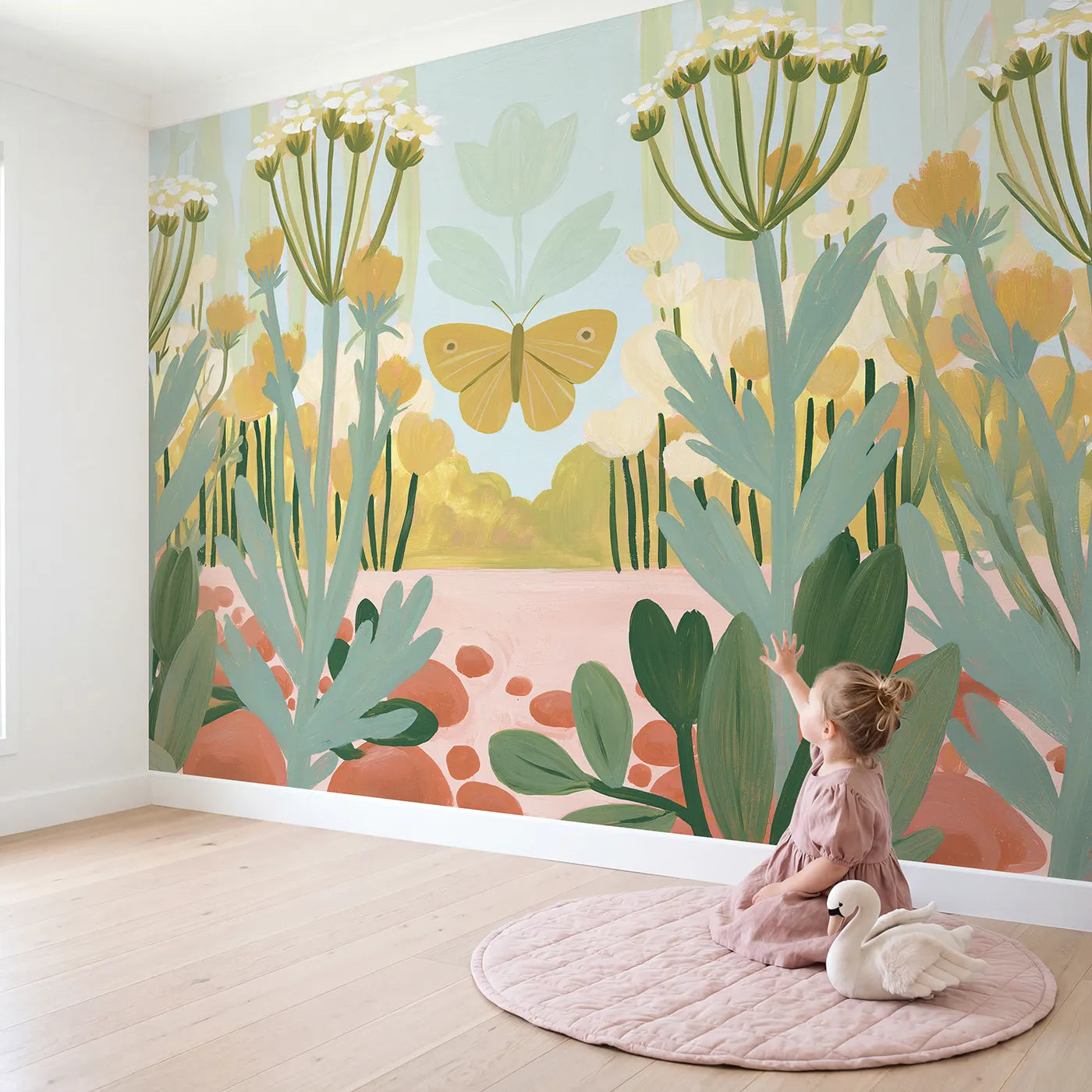 Child in nursery with Folk Butterfly Bold Wallpaper Mural by Whimsy Tots