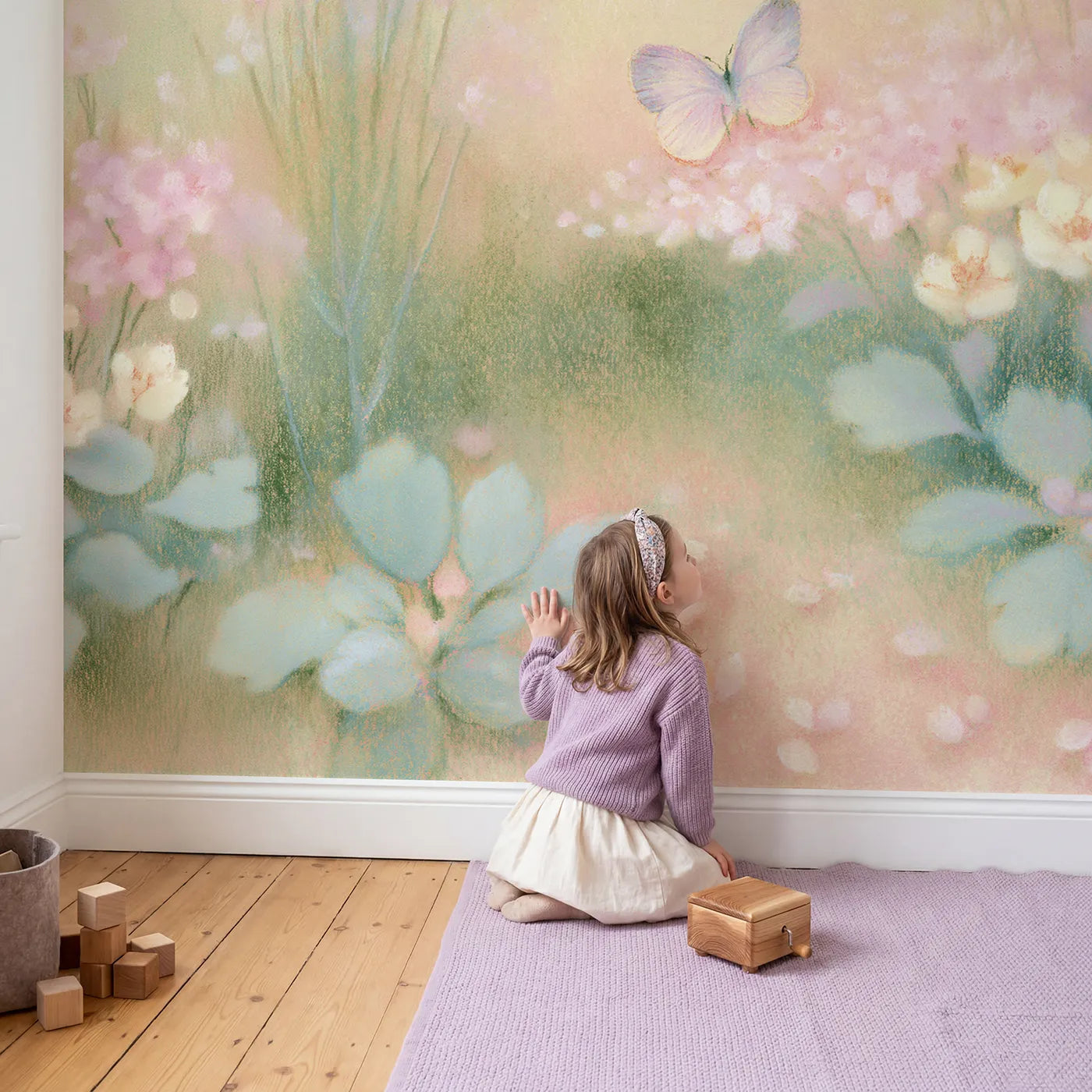 Child in nursery with Little Baby Butterfly Wallpaper Mural by Whimsy Tots
