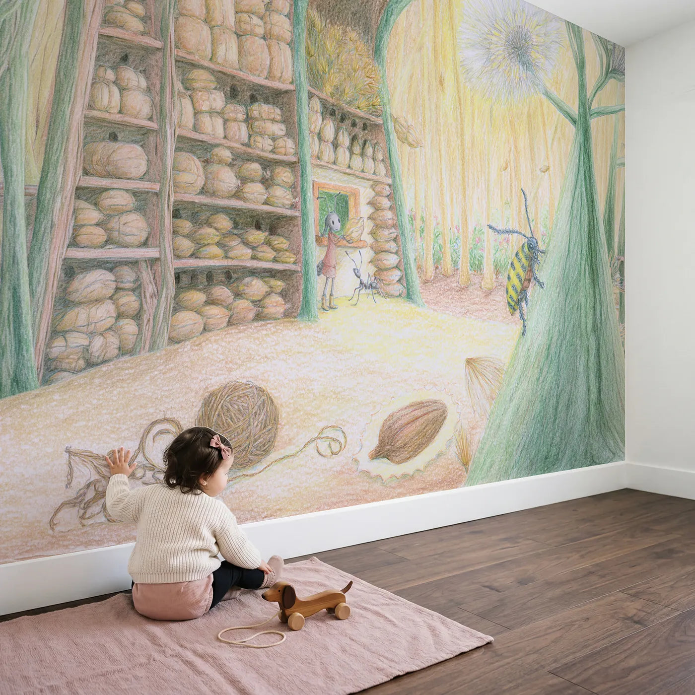 Child in nursery with The Seed Post Office Wallpaper Mural by Whimsy Tots