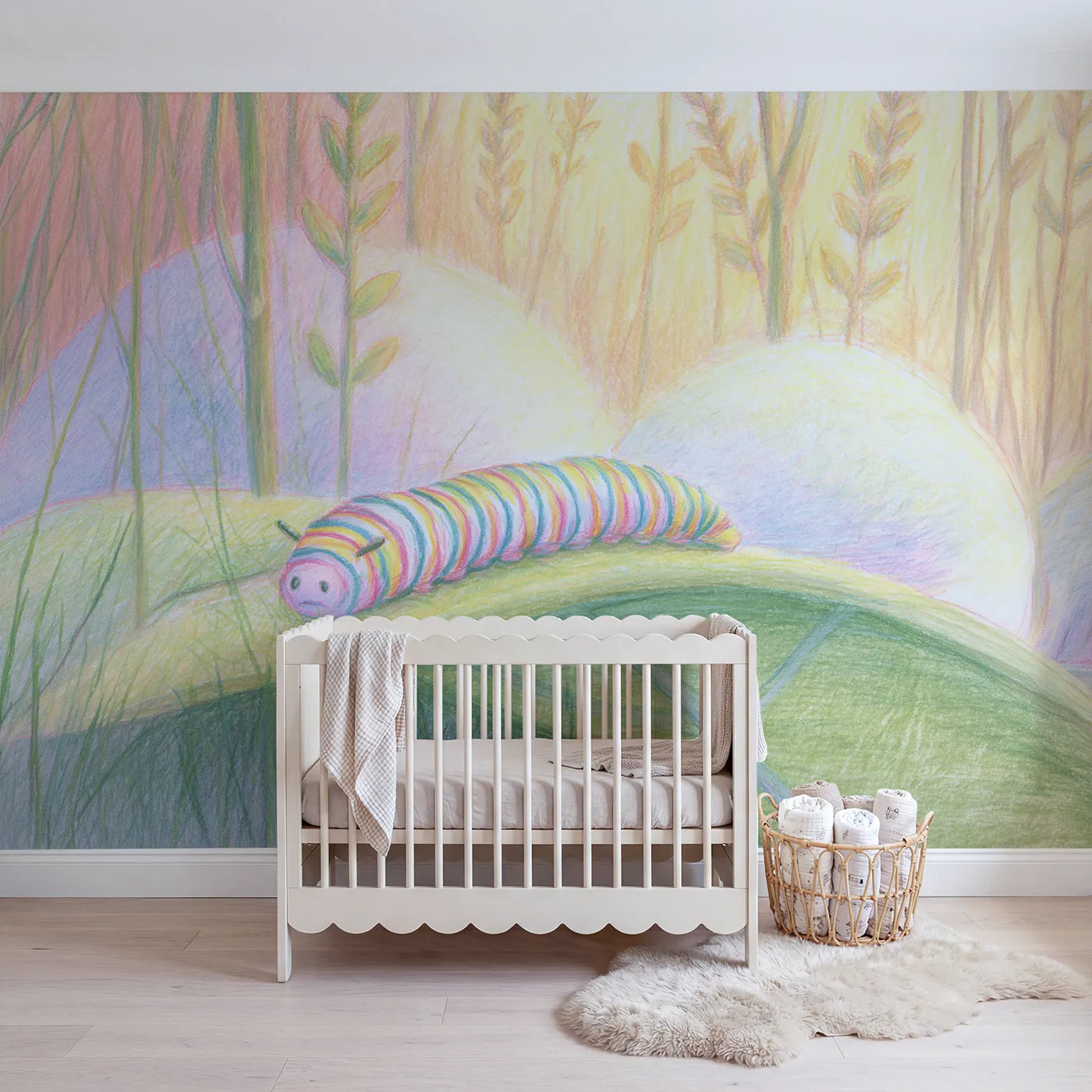 Colored-pencil wall mural of a striped caterpillar by Whimsy Tots
