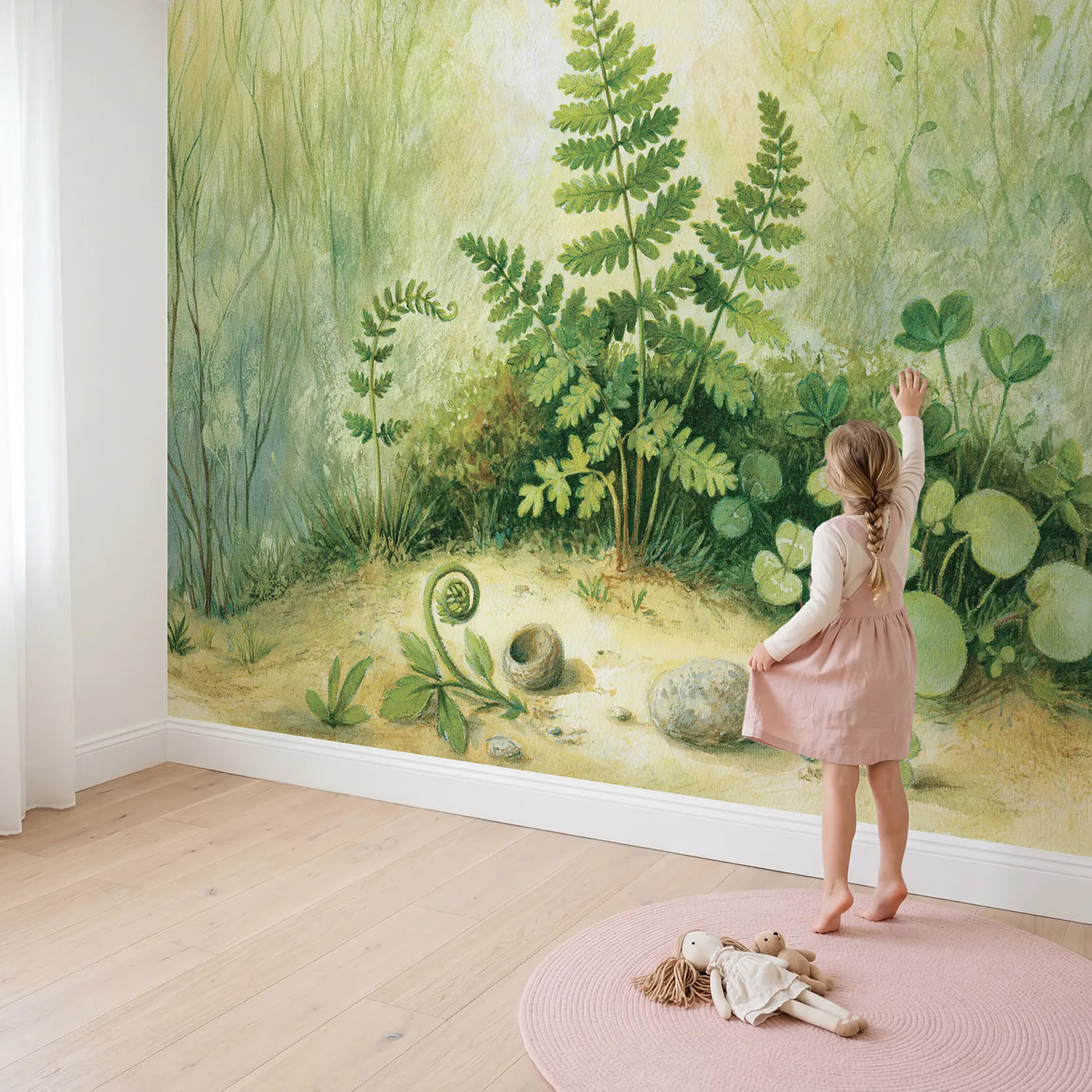 Child in nursery with Friendly Little Fern Wallpaper Mural by Whimsy Tots