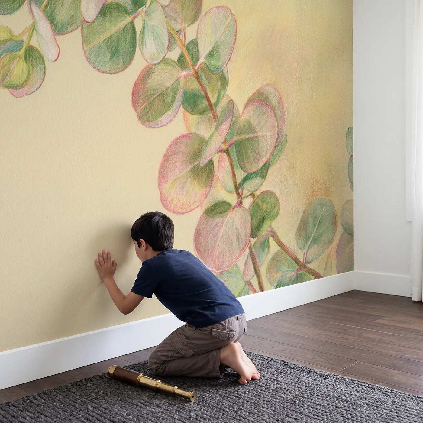 Child in nursery with Eucalyptus Sprig Wallpaper Mural by Whimsy Tots