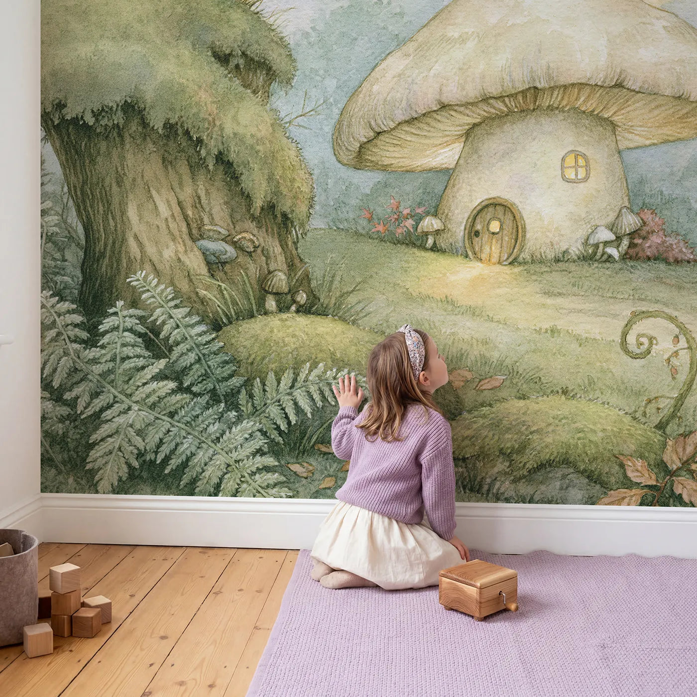 Child in nursery with Mushroom Cottage Home Wallpaper Mural by Whimsy Tots