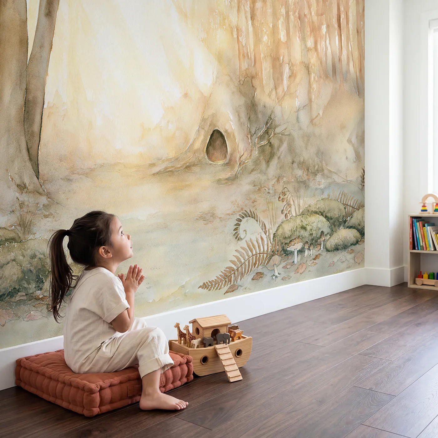 Child in nursery with Cozy Tree Hollow Wallpaper Mural by Whimsy Tots
