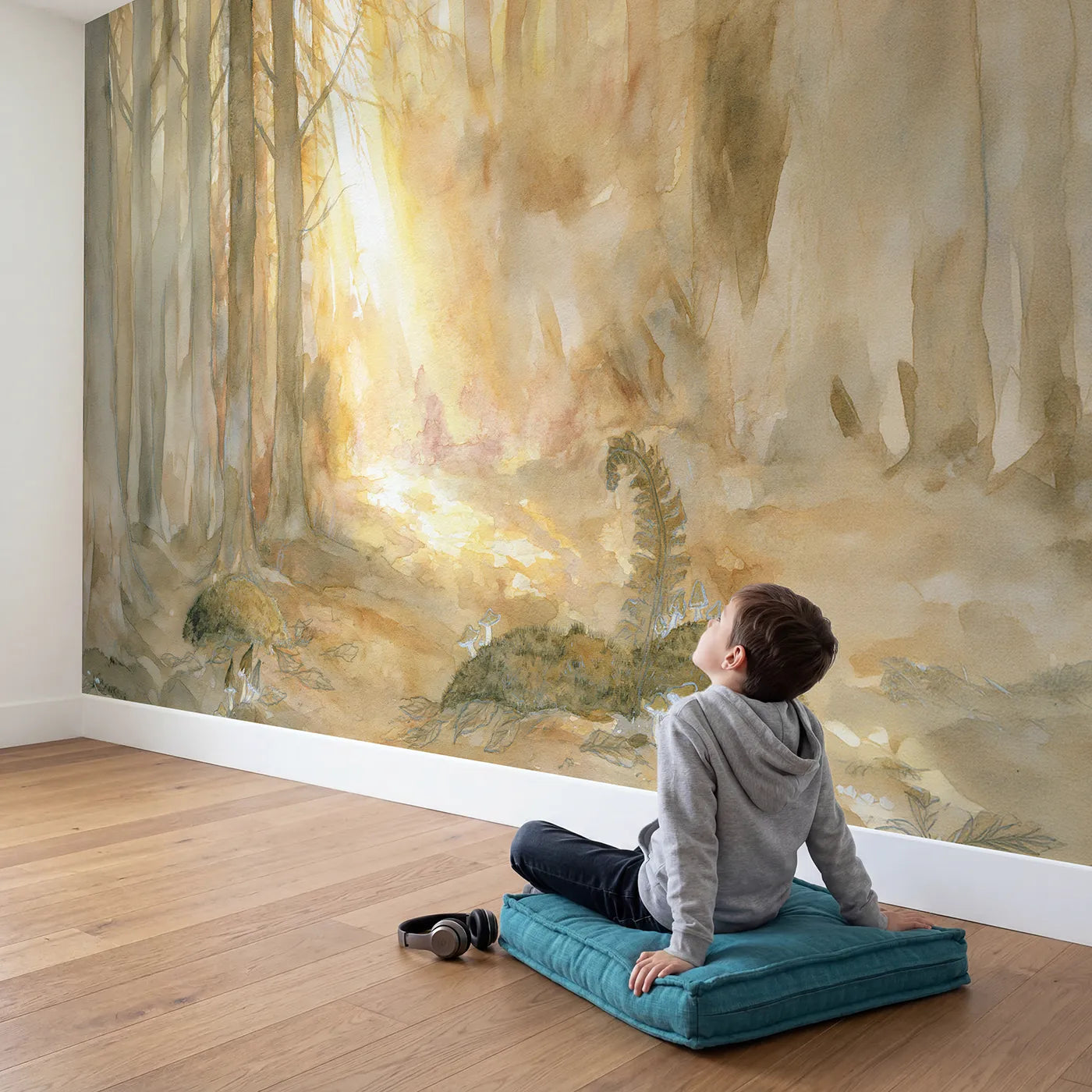 Child in nursery with Gentle Forest Glow Wallpaper Mural by Whimsy Tots