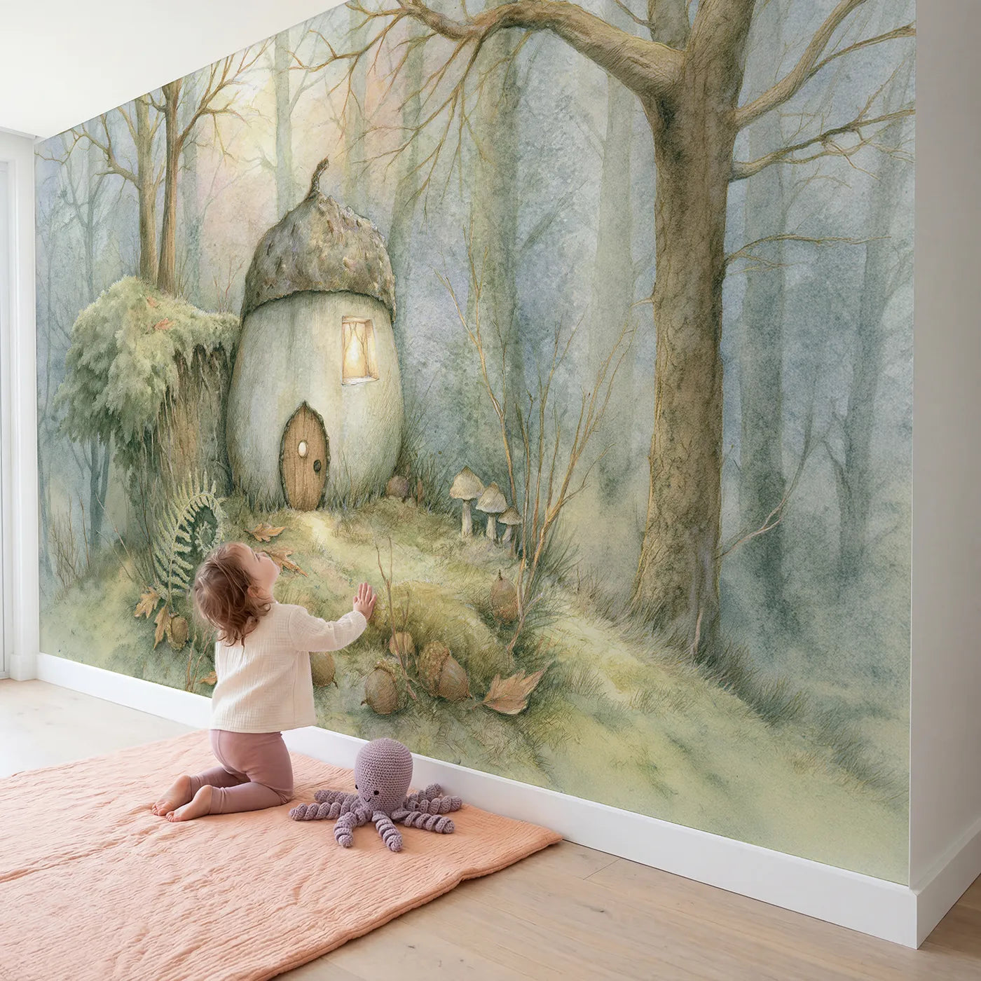 Child in nursery with Cozy Acorn House Wallpaper Mural by Whimsy Tots