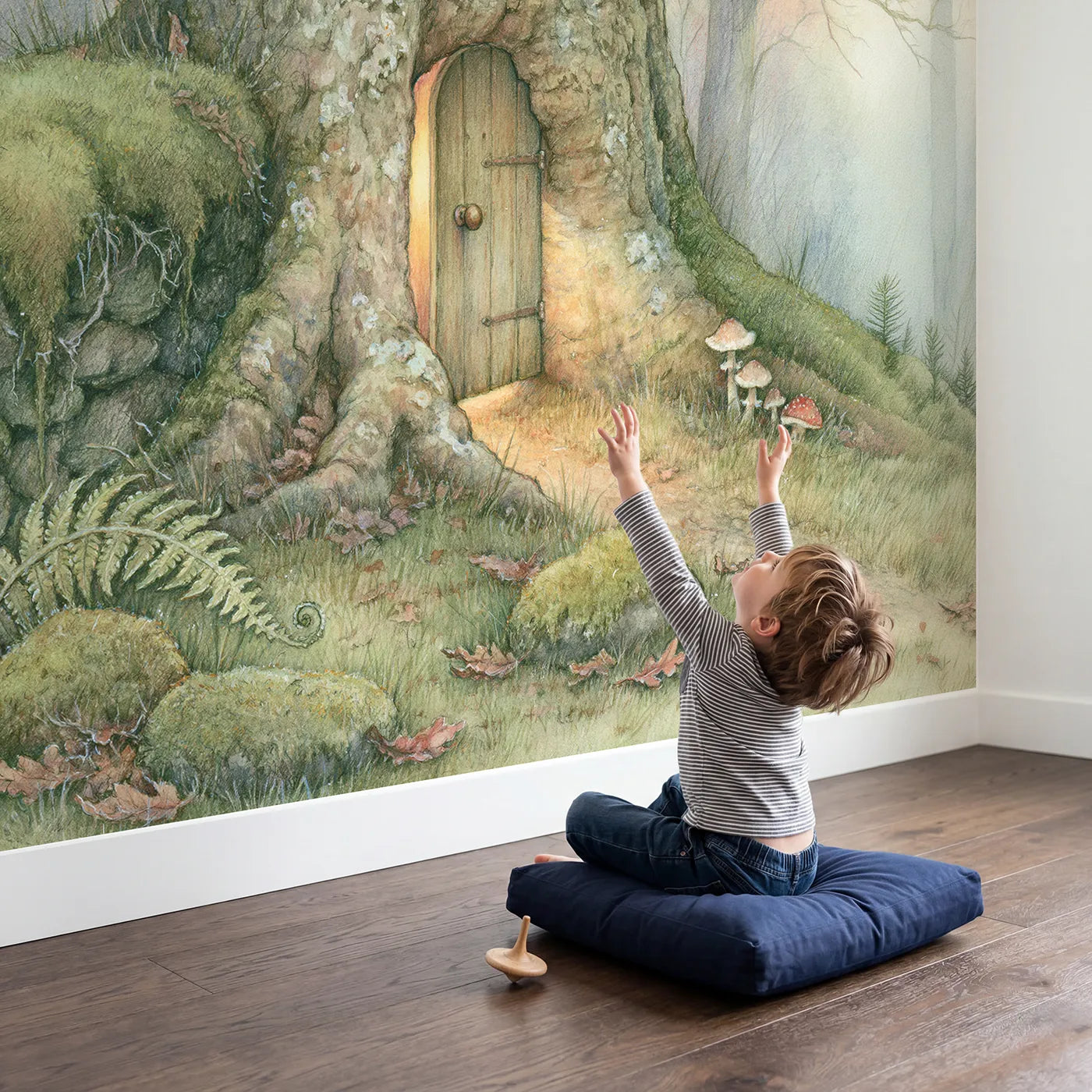 Child in nursery with Snug Woodland Door Wallpaper Mural by Whimsy Tots