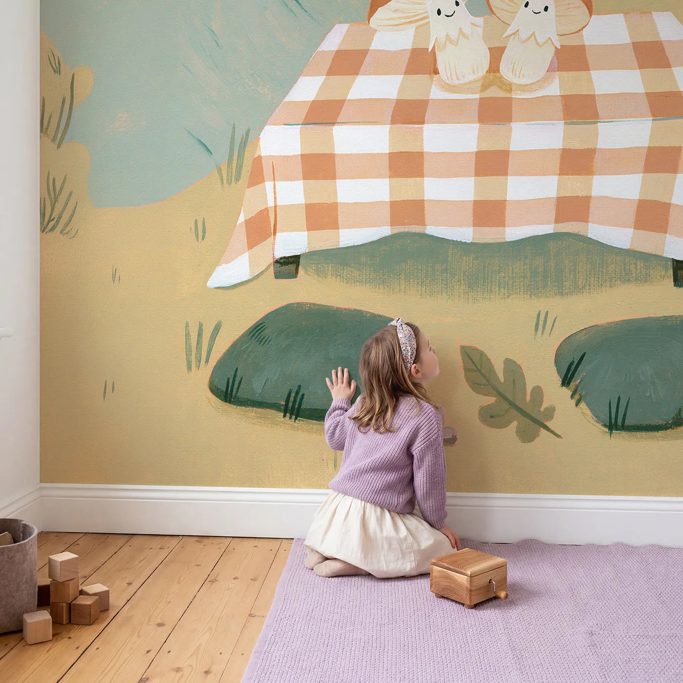 Child in nursery with Folk Gingham Picnic Wallpaper Mural by Whimsy Tots