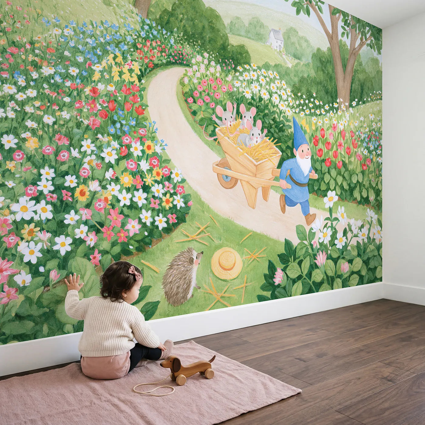 Child in nursery with The Wheelbarrow Ride Wallpaper Mural by Whimsy Tots