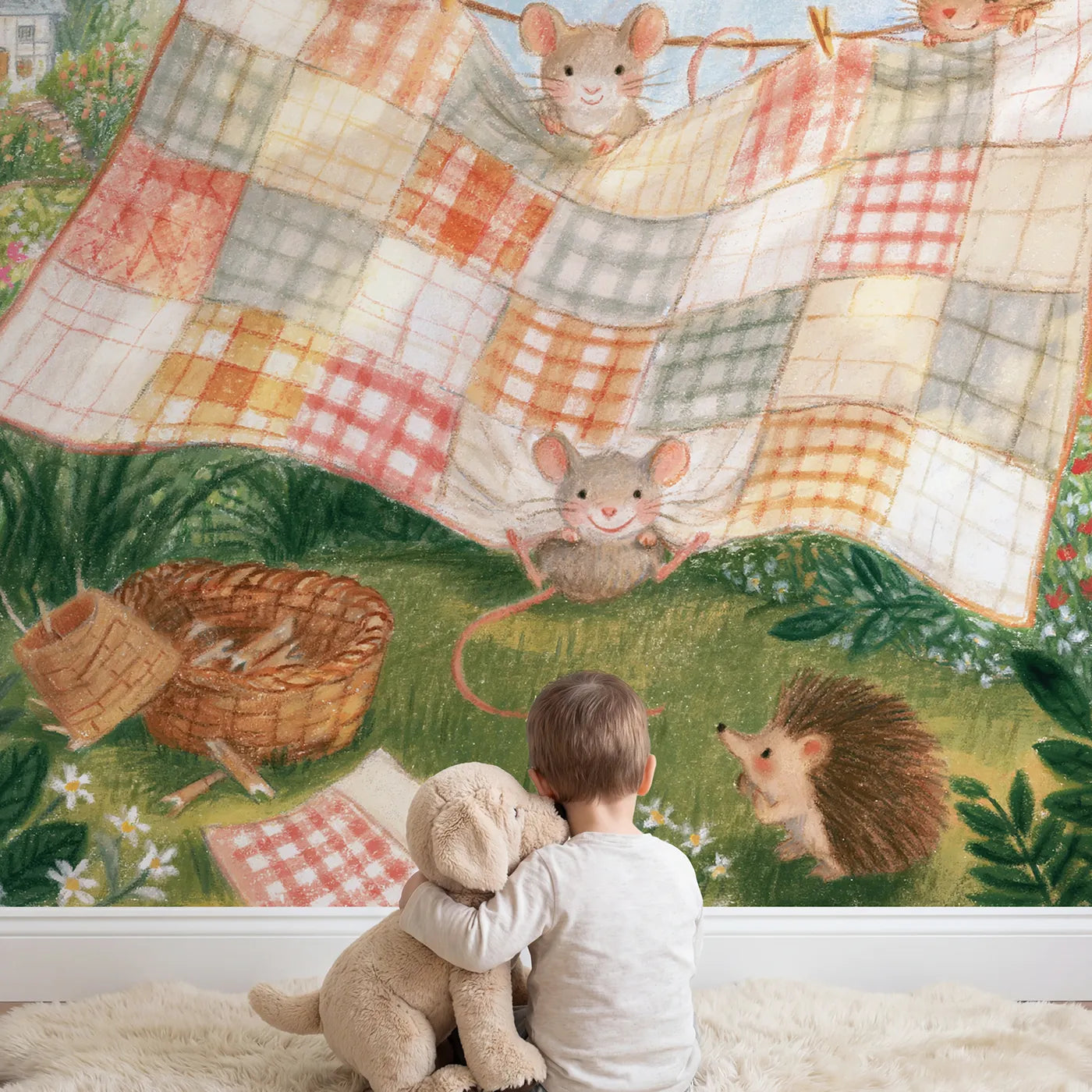 Child in nursery with The Quilt Airing Wallpaper Mural by Whimsy Tots
