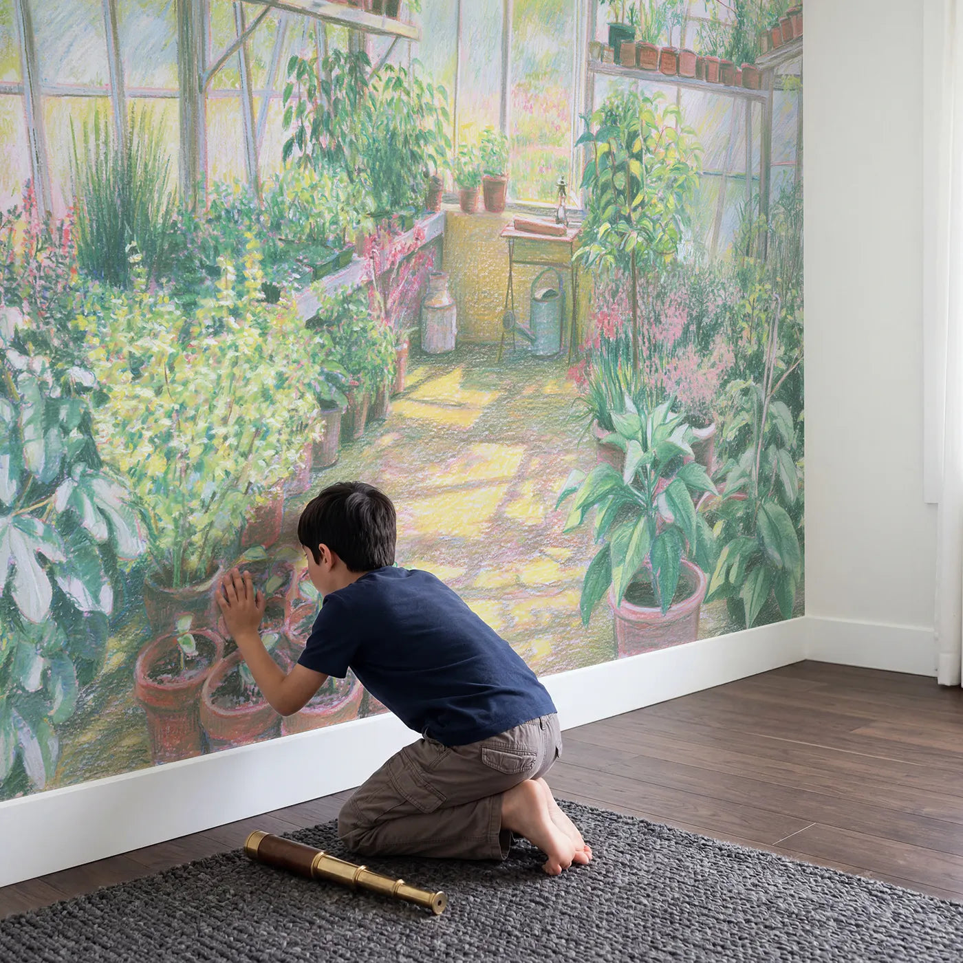 Child in nursery with Sunlit Greenhouse Wallpaper Mural by Whimsy Tots