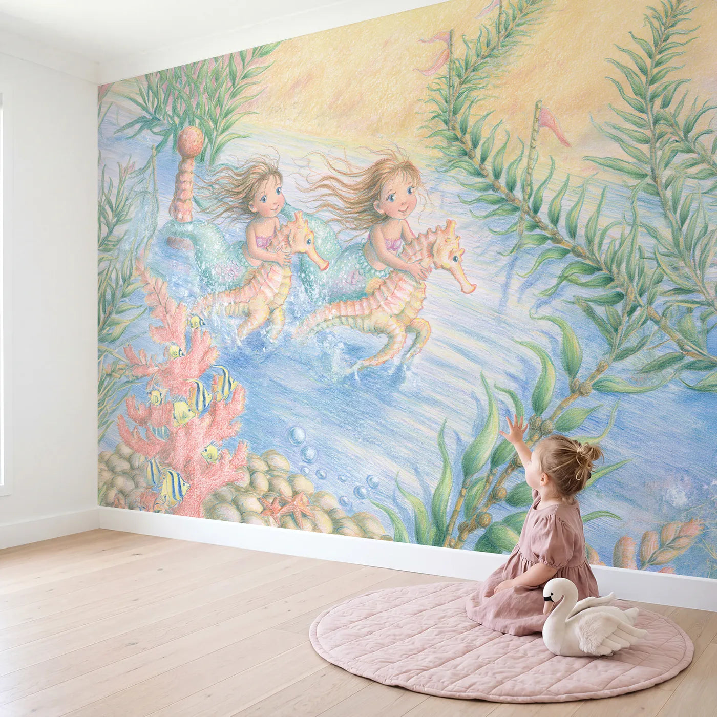 Child in nursery with Mermaid Seahorse Race Wallpaper Mural by Whimsy Tots