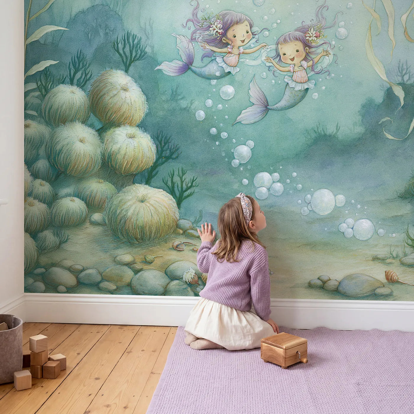 Child in nursery with Mermaid Bubble Dance Wallpaper Mural by Whimsy Tots