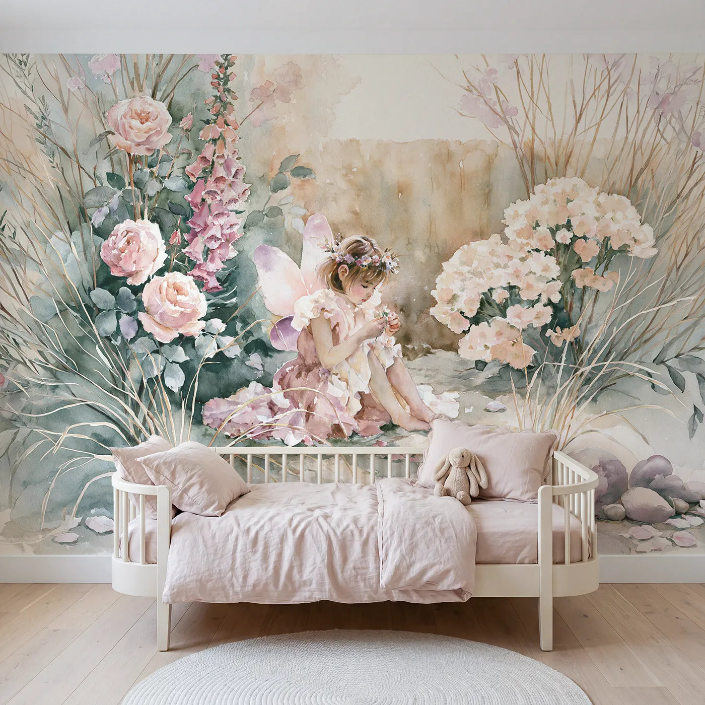 Watercolor wall mural of a fairy weaving a flower crown on blush by Whimsy Tots