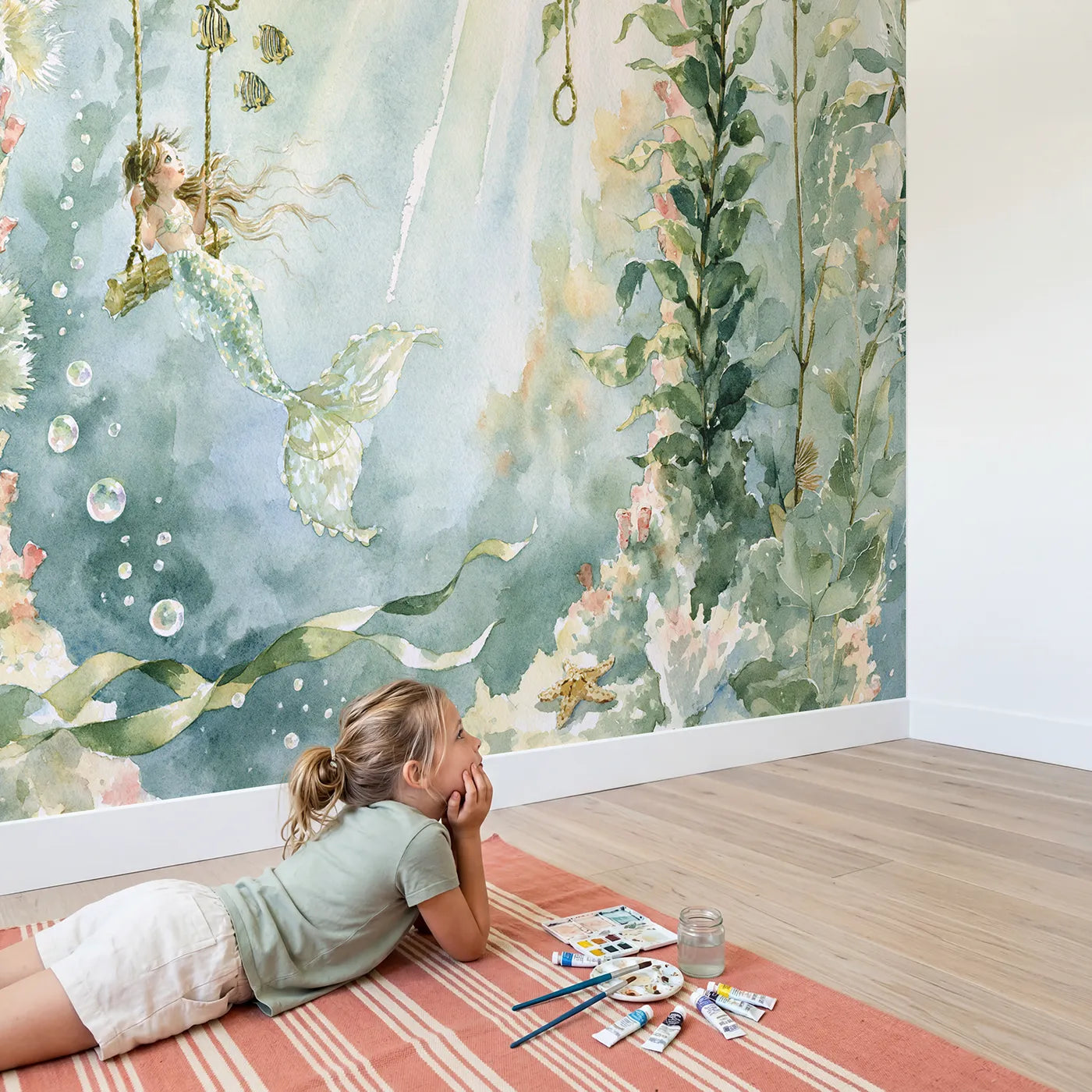 Child in nursery with Mermaid Kelp Swing Wallpaper Mural by Whimsy Tots