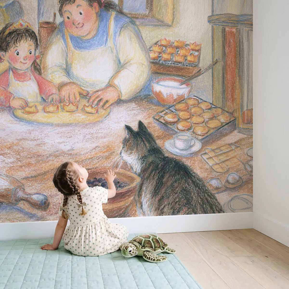 Child in nursery with Royal Cookie Baking Wallpaper Mural by Whimsy Tots
