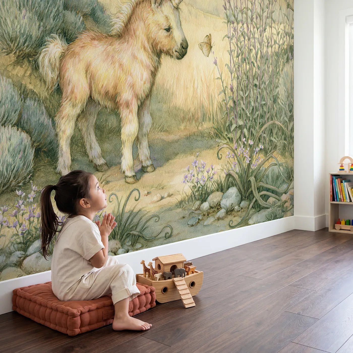 Child in nursery with Little Unicorn Friend Wallpaper Mural by Whimsy Tots