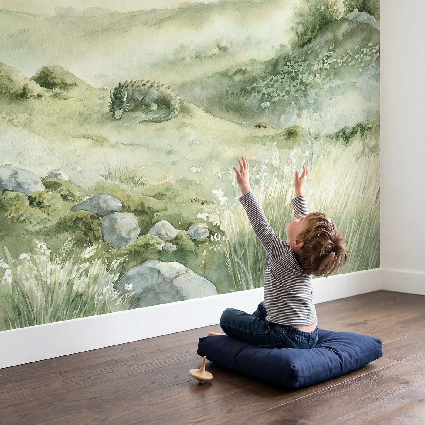 Child in nursery with Misty Dragon Valley Wallpaper Mural by Whimsy Tots