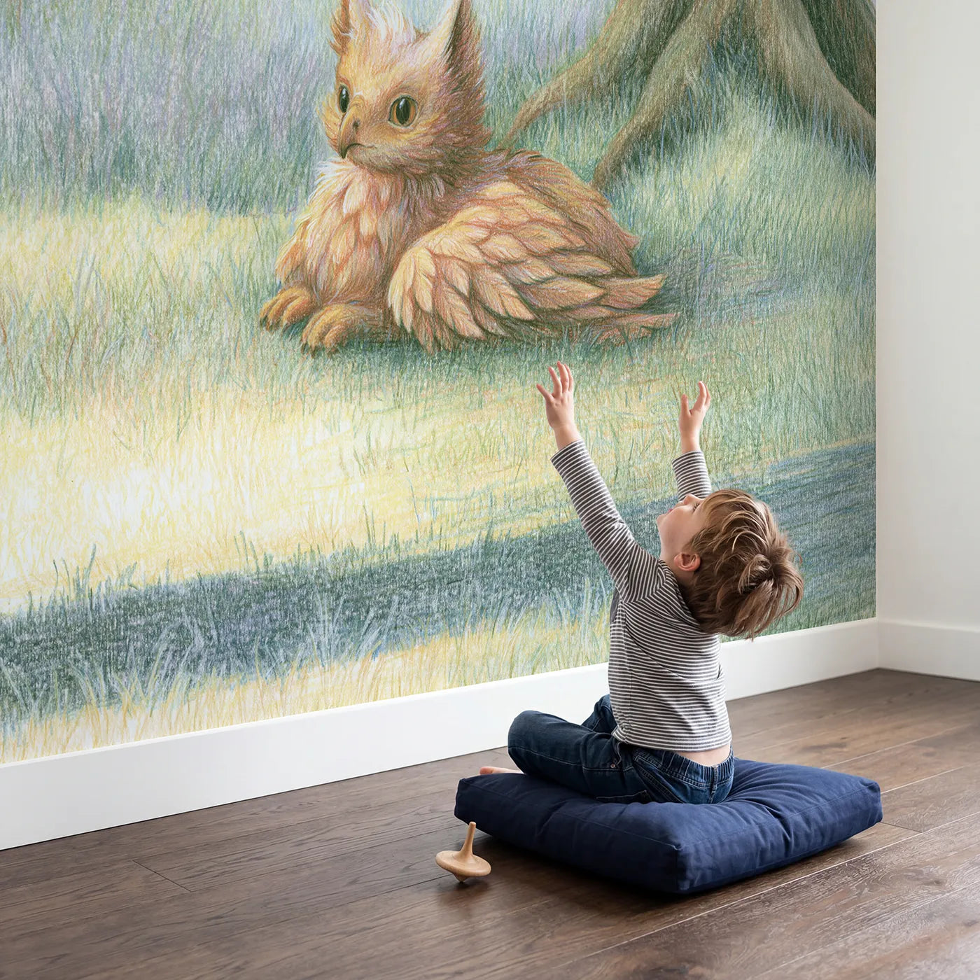 Child in nursery with Resting Baby Griffin Wallpaper Mural by Whimsy Tots