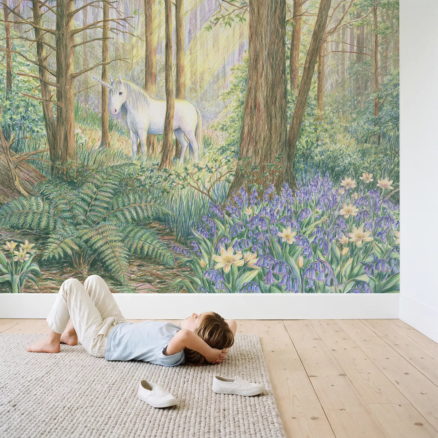 Child in nursery with Enchanted Forest Glade Wallpaper Mural by Whimsy Tots