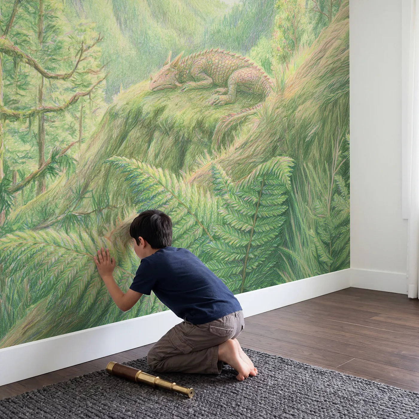 Child in nursery with Sleepy Dragon Valley Wallpaper Mural by Whimsy Tots