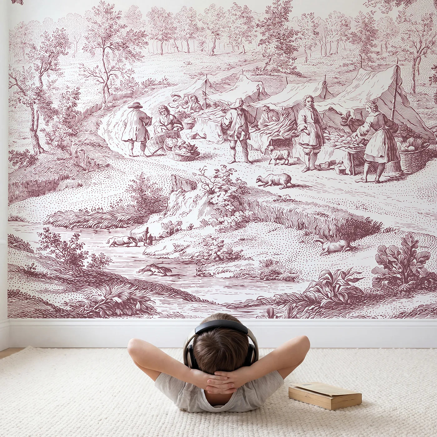 Child in nursery with Market Morning Bustle Wallpaper Mural in Pink by Whimsy Tots