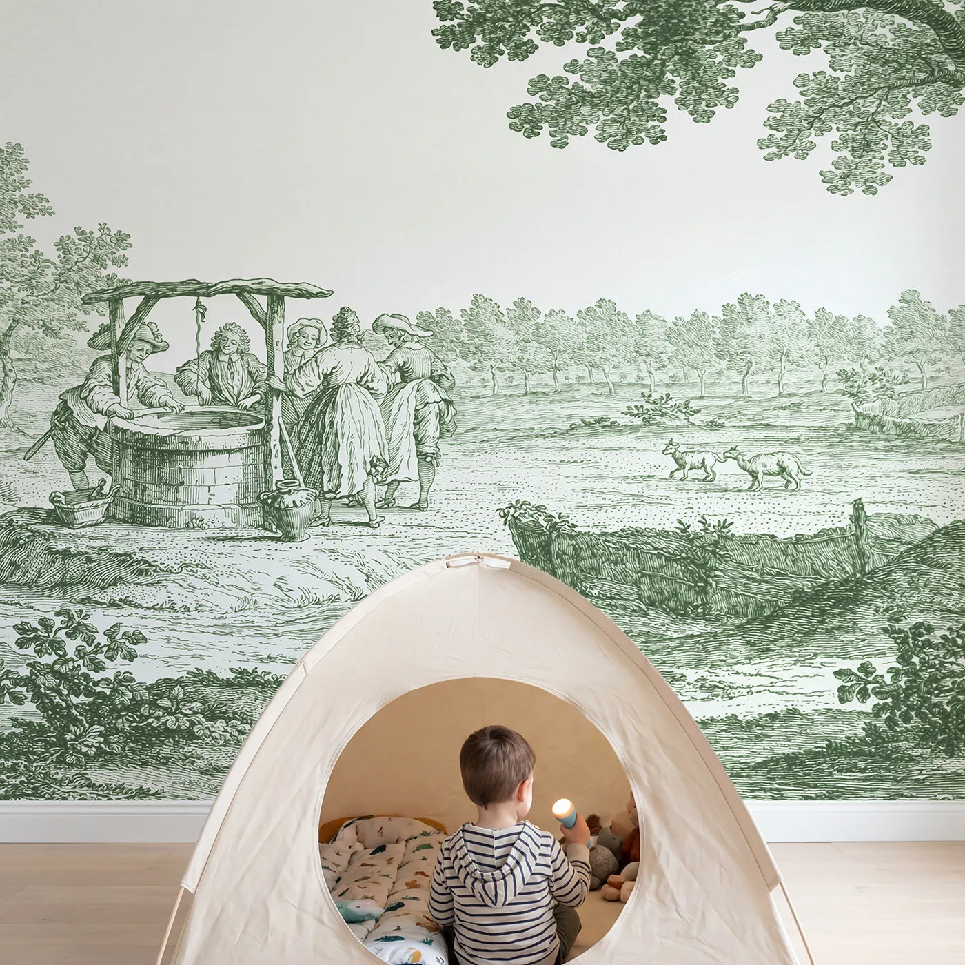 Child in nursery with Village Well Gathering Wallpaper Mural in Green by Whimsy Tots