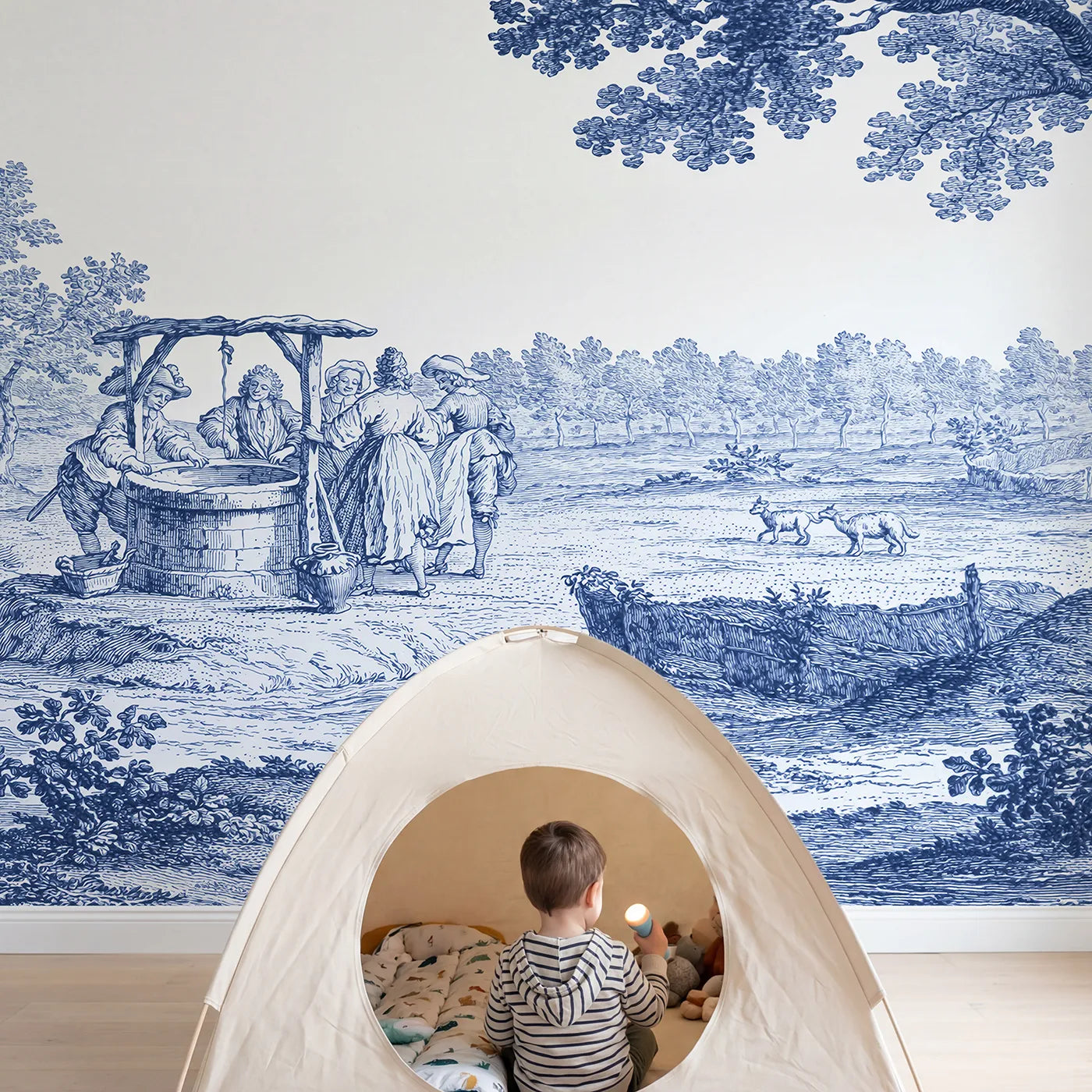 Child in nursery with Village Well Gathering Wallpaper Mural by Whimsy Tots