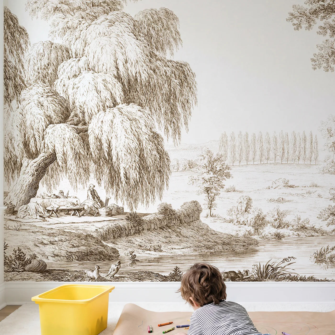 Child in nursery with Picnic Under Willow Wallpaper Mural in Brown by Whimsy Tots