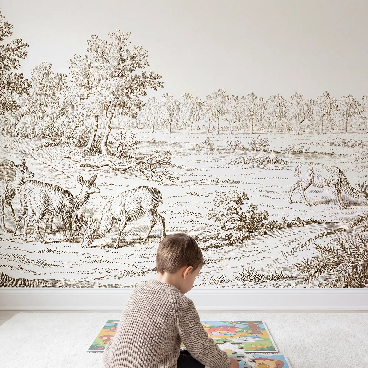 Child in nursery with Grazing Deer Glade Wallpaper Mural in Brown by Whimsy Tots