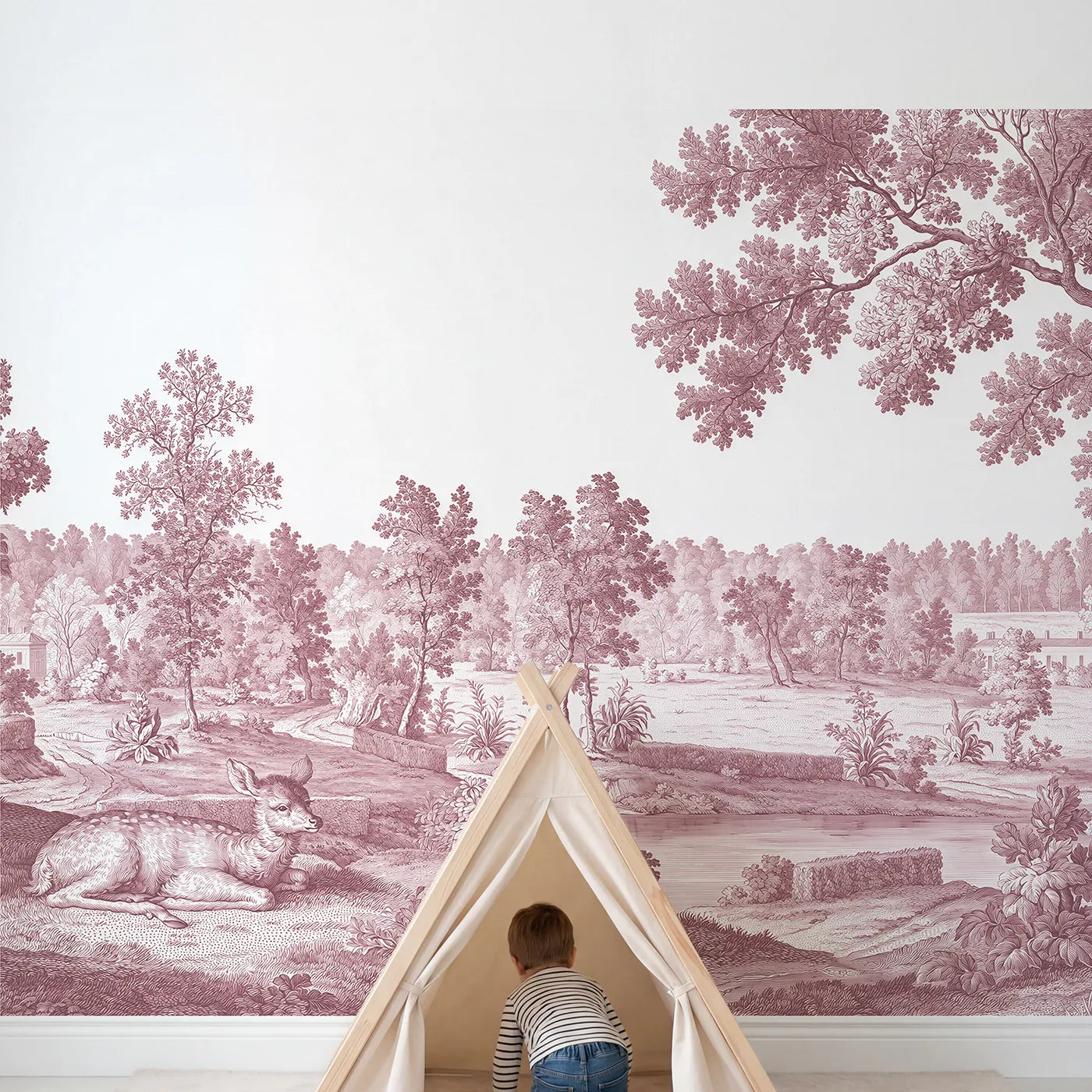 Child in nursery with Resting Fawn Meadow Wallpaper Mural in Pink by Whimsy Tots