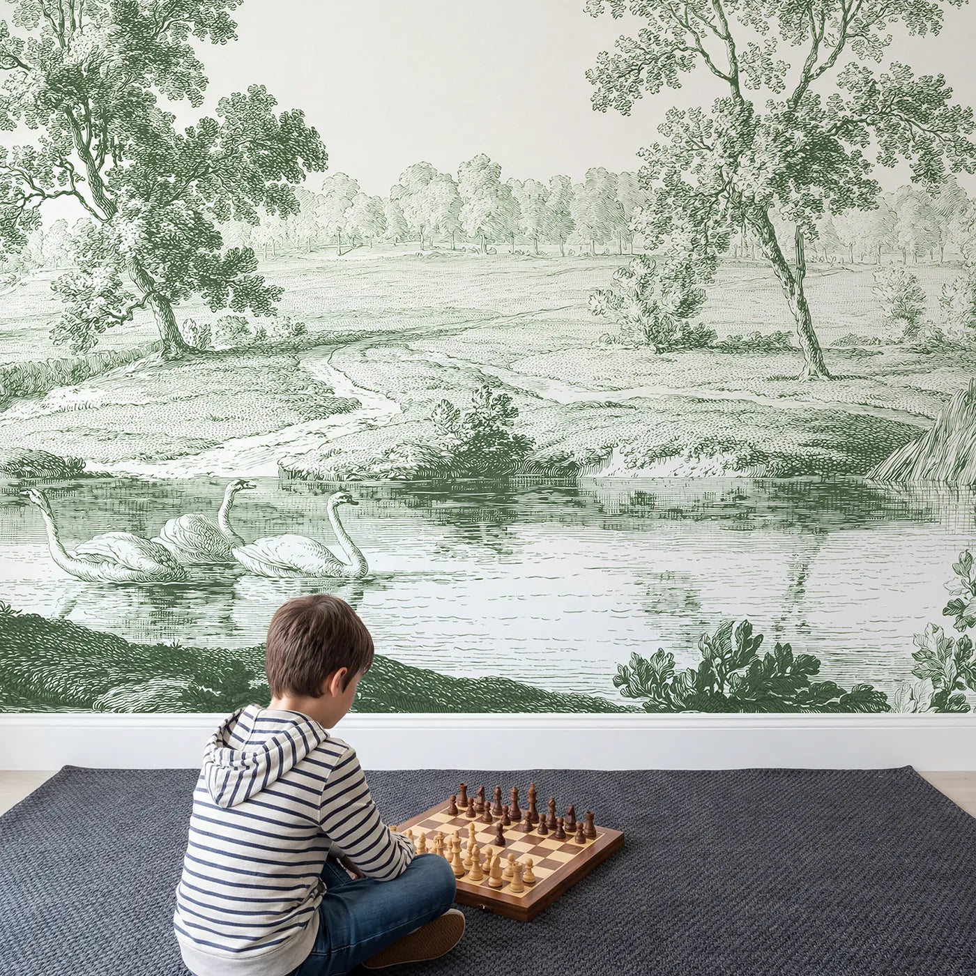 Child in nursery with Gliding Swan Pond Wallpaper Mural in Green by Whimsy Tots