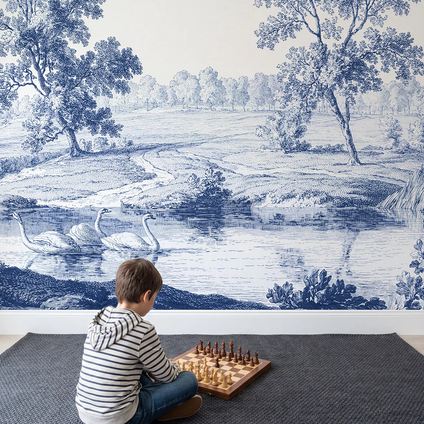 Child in nursery with Gliding Swan Pond Wallpaper Mural by Whimsy Tots