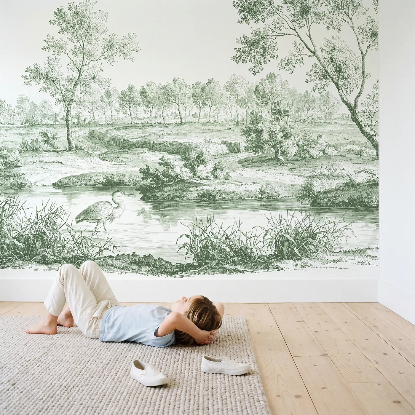 Child in nursery with Heron Marsh Wade Wallpaper Mural in Green by Whimsy Tots