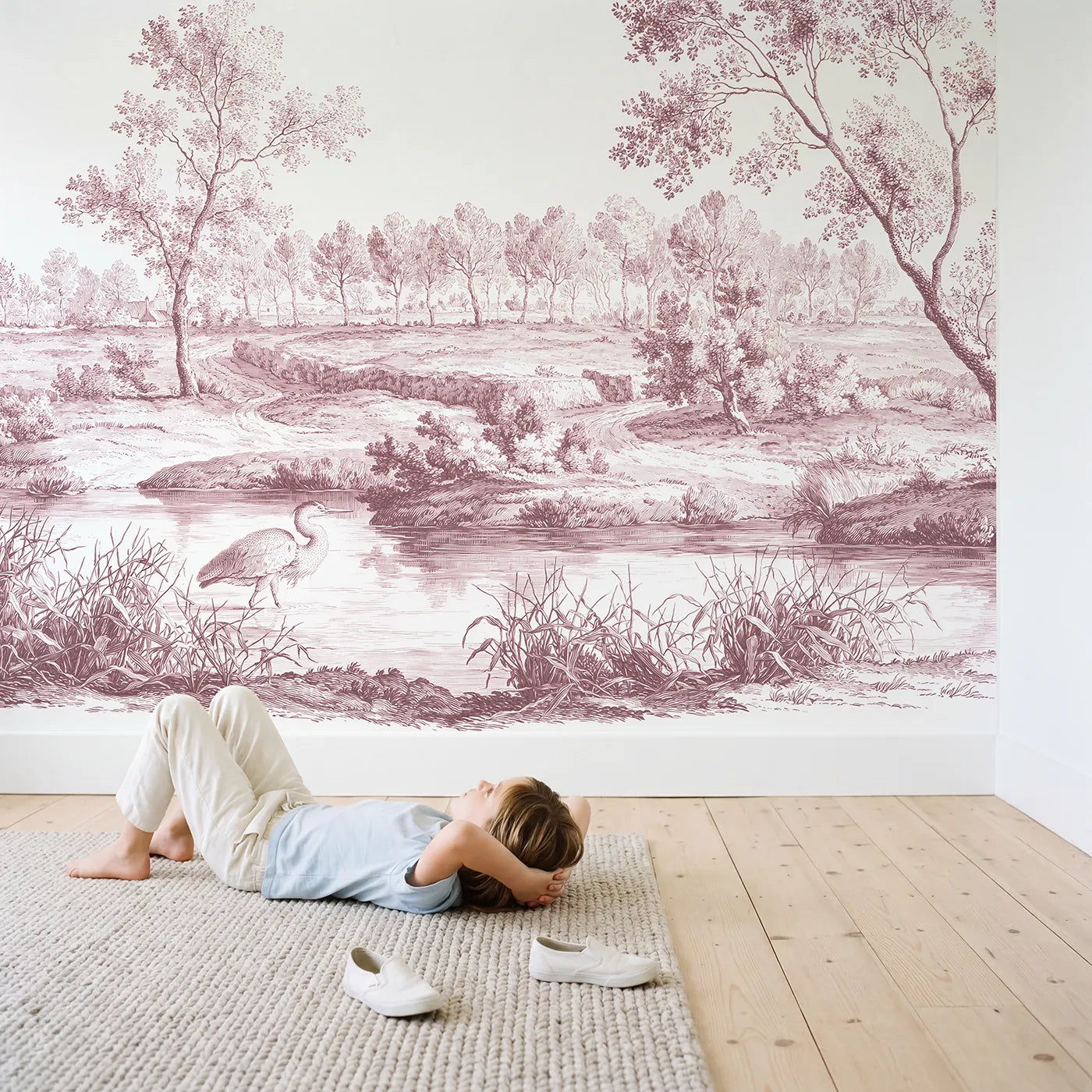 Child in nursery with Heron Marsh Wade Wallpaper Mural in Pink by Whimsy Tots