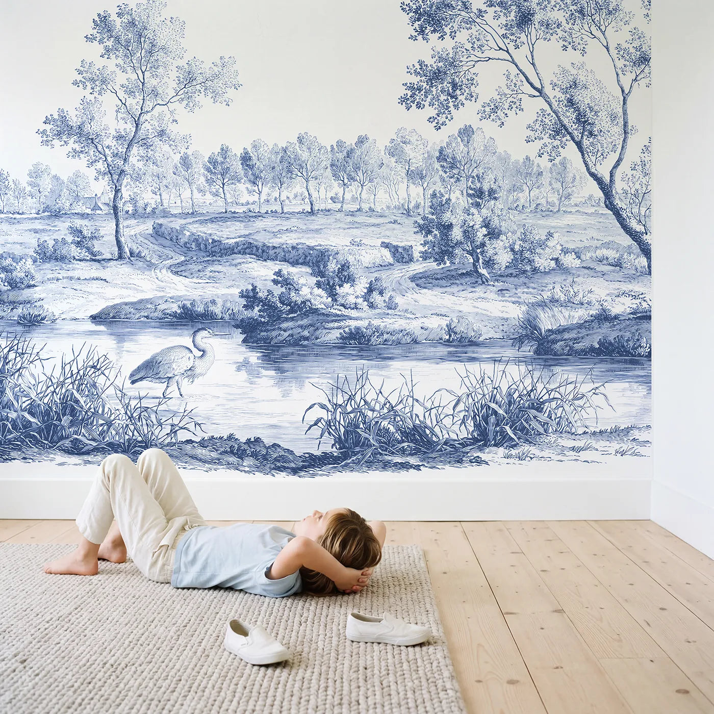 Child in nursery with Heron Marsh Wade Wallpaper Mural by Whimsy Tots