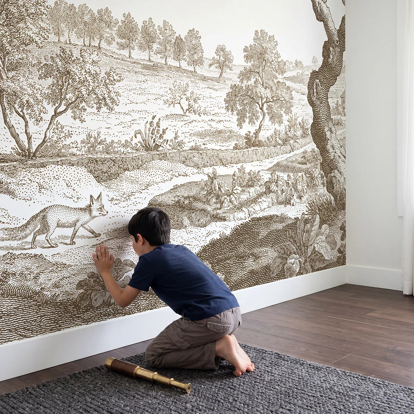 Child in nursery with Strolling Garden Fox Wallpaper Mural in Brown by Whimsy Tots