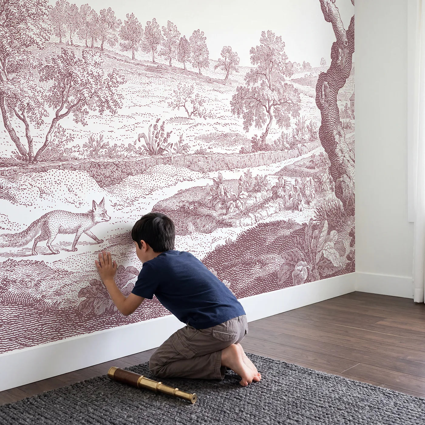 Child in nursery with Strolling Garden Fox Wallpaper Mural in Pink by Whimsy Tots