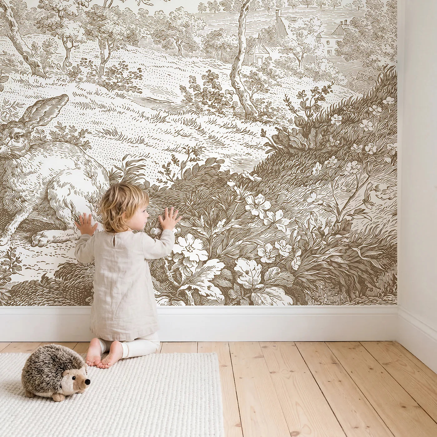 Child in nursery with Hedgerow Hare Pair Wallpaper Mural in Brown by Whimsy Tots