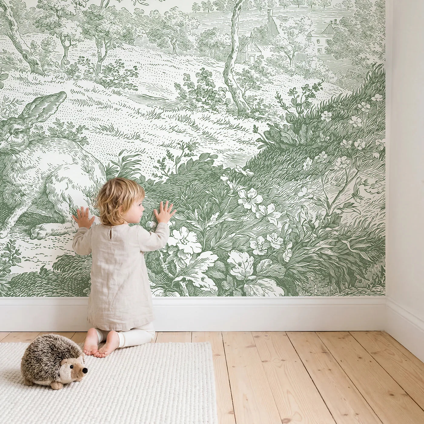 Child in nursery with Hedgerow Hare Pair Wallpaper Mural in Green by Whimsy Tots