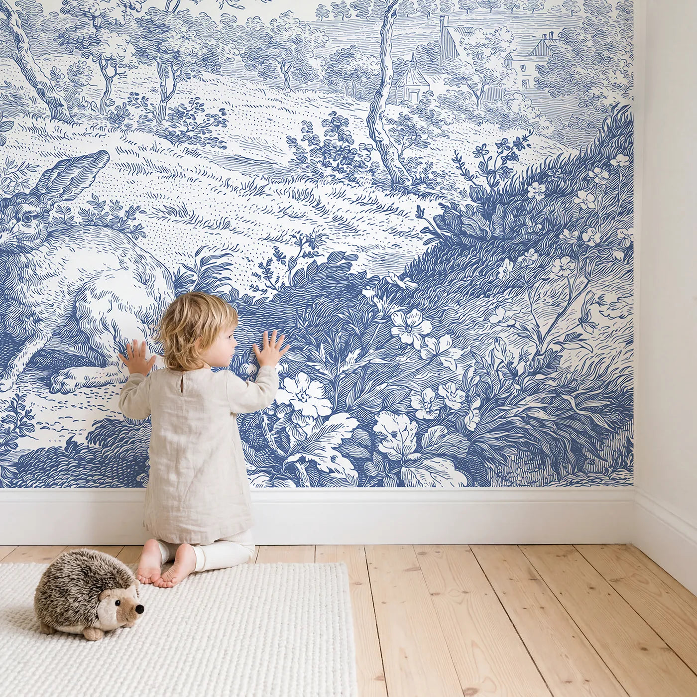 Child in nursery with Hedgerow Hare Pair Wallpaper Mural by Whimsy Tots