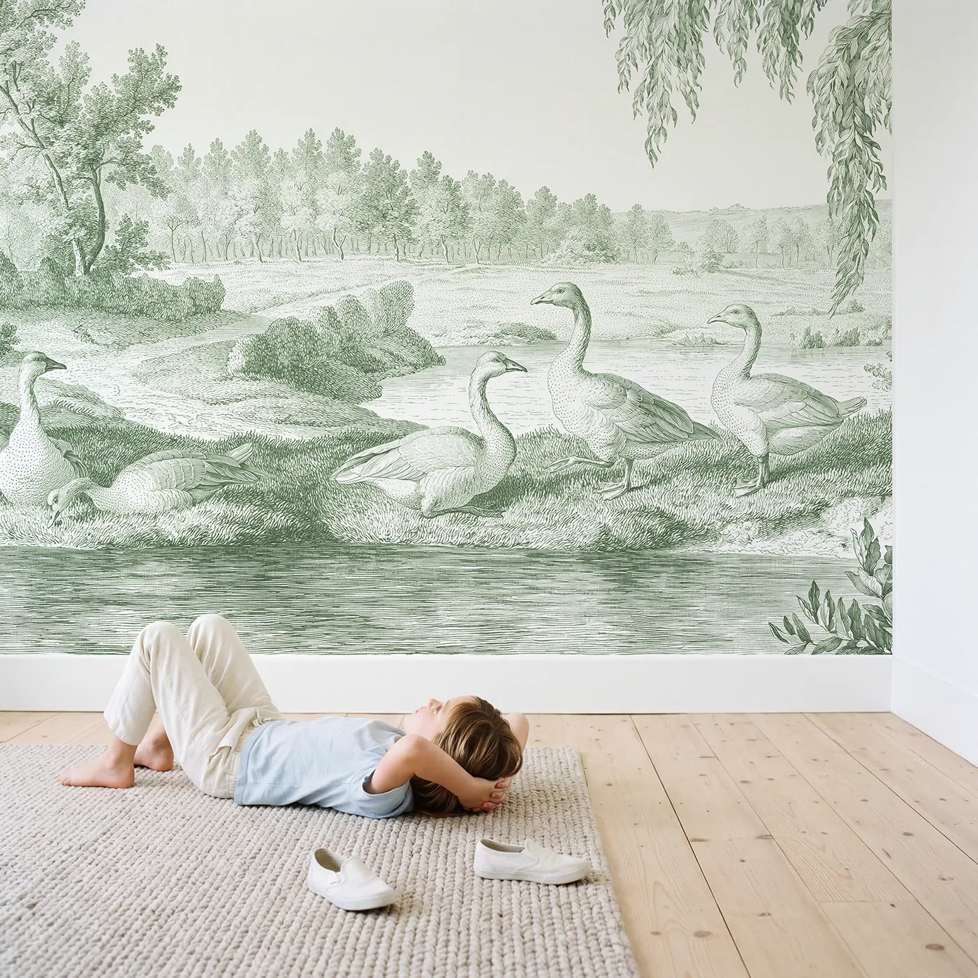Child in nursery with Goose Pond Morning Wallpaper Mural in Green by Whimsy Tots