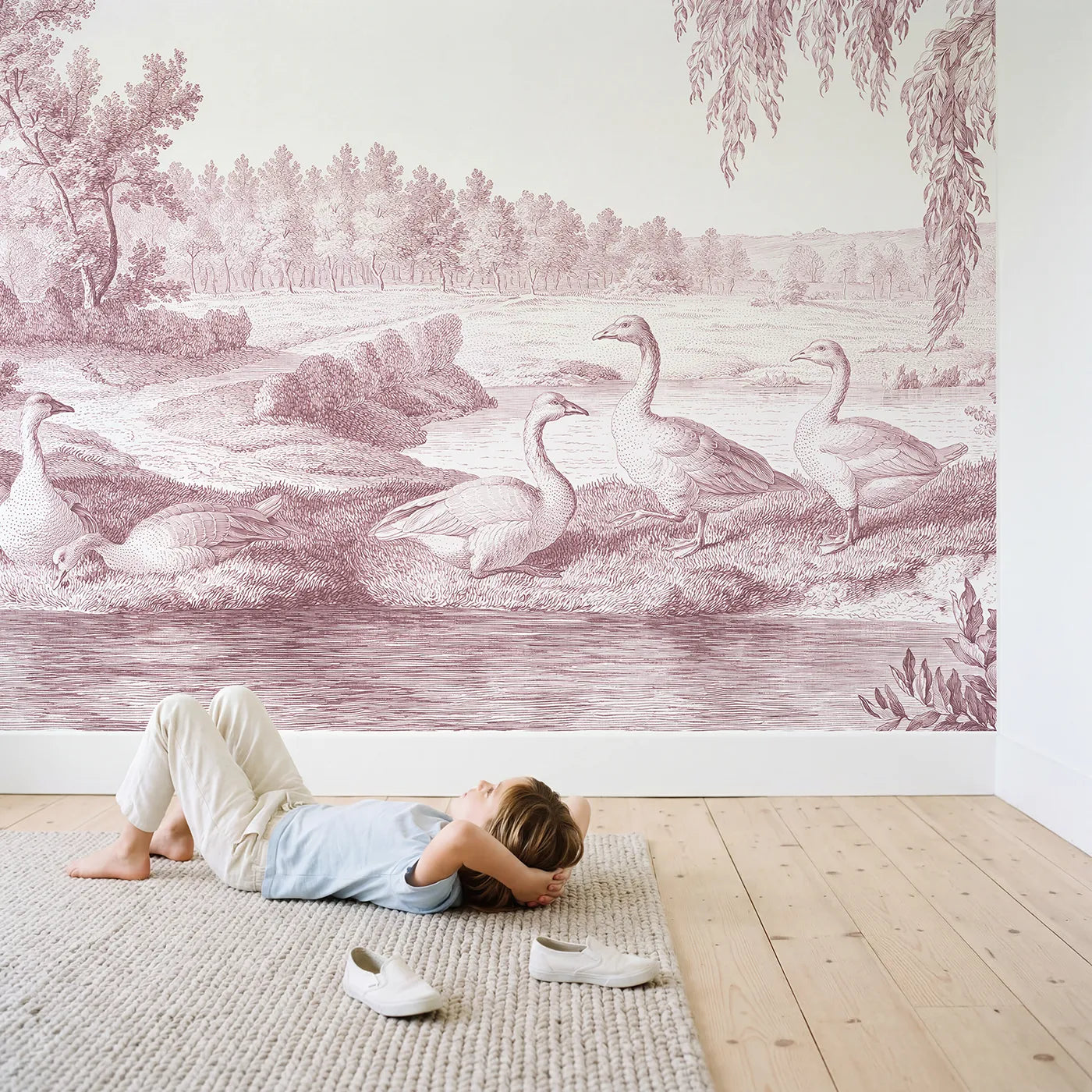 Child in nursery with Goose Pond Morning Wallpaper Mural in Pink by Whimsy Tots