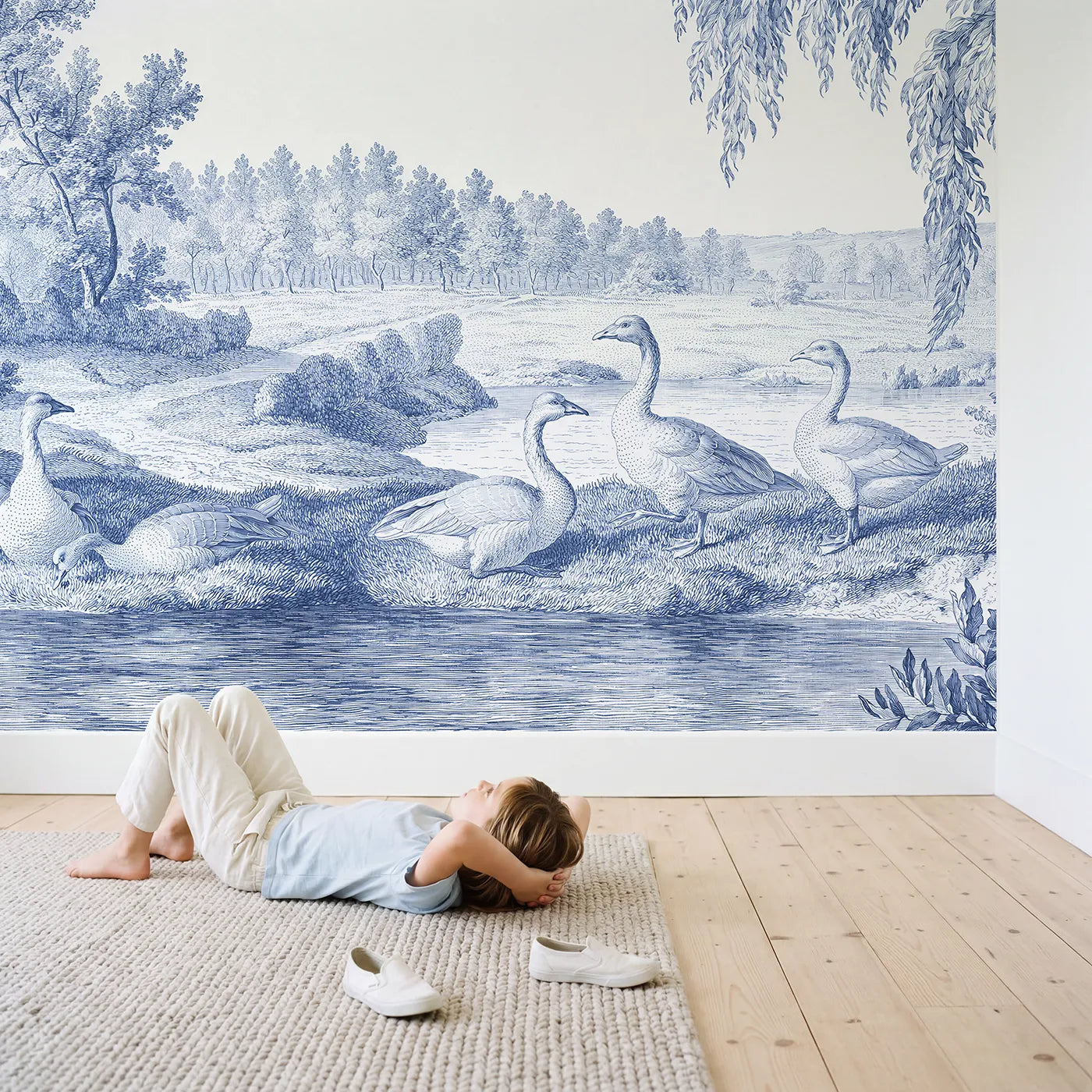 Child in nursery with Goose Pond Morning Wallpaper Mural by Whimsy Tots