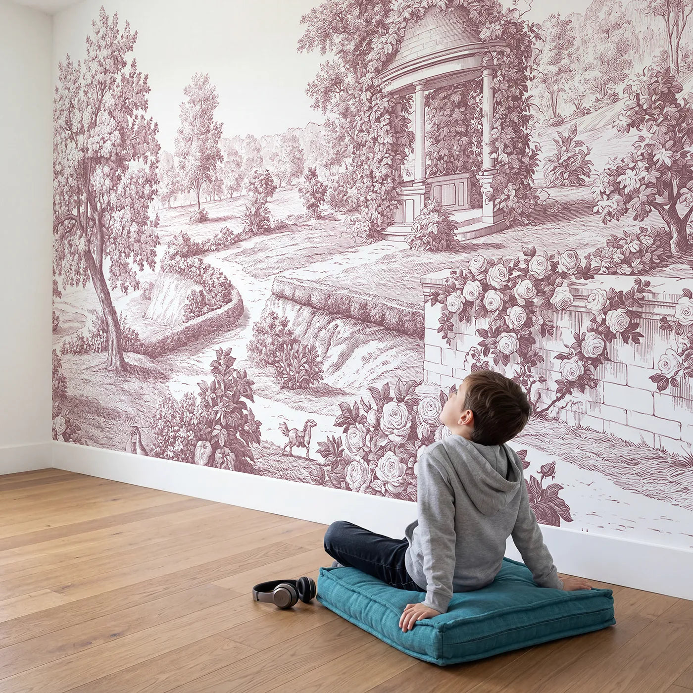 Child in nursery with Village Gazebo Garden Wallpaper Mural in Pink by Whimsy Tots