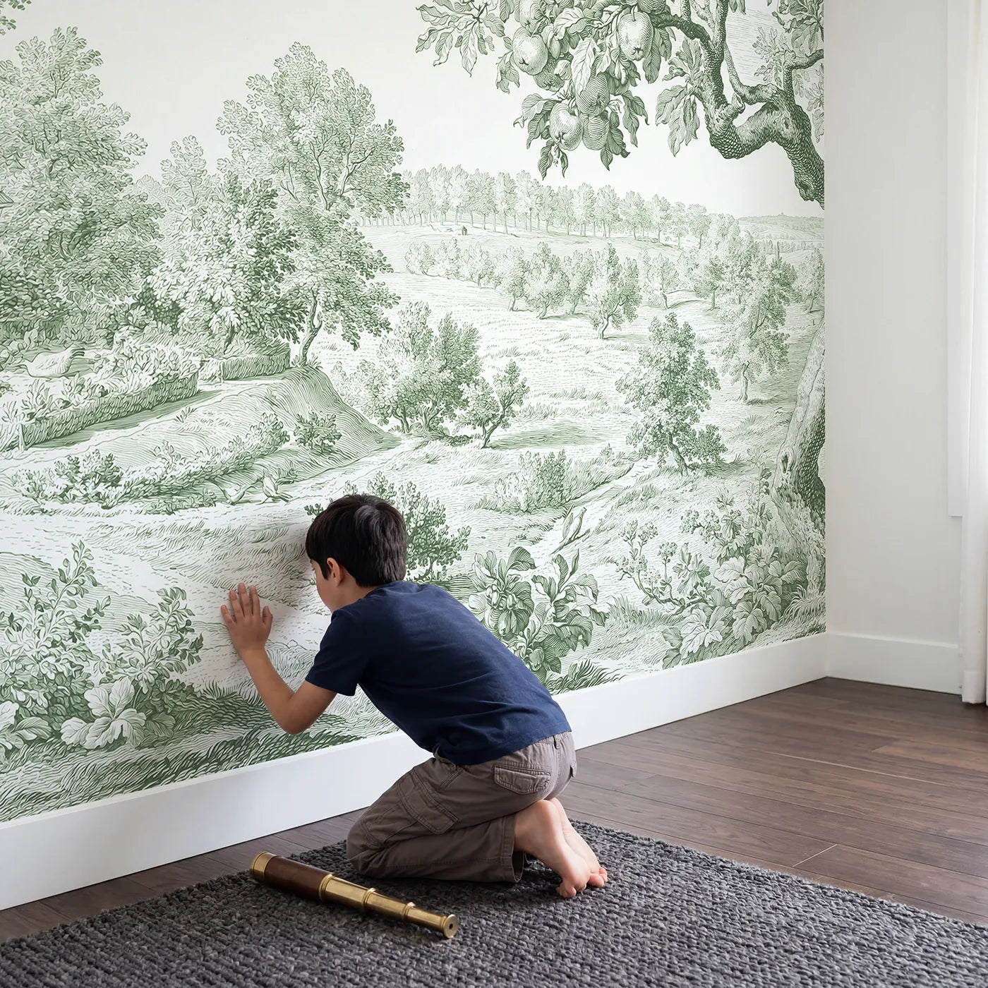 Child in nursery with Dovecote Garden Corner Wallpaper Mural in Green by Whimsy Tots
